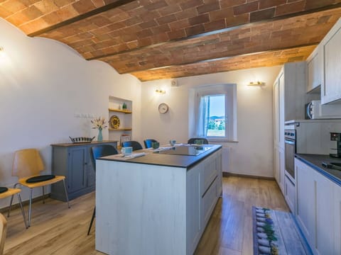 Furniture, Interior Design, Flooring, Floor, Ceiling, Wood, Countertop, Kitchen, Room, Lighting