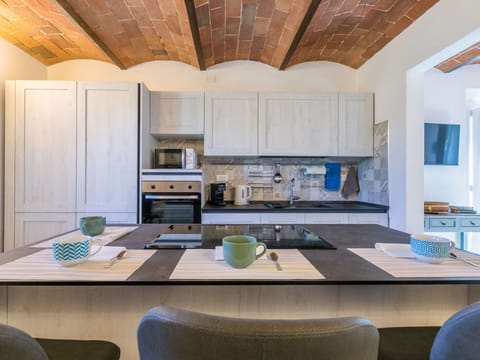 Furniture, Interior Design, Kitchen, Flooring, Countertop, Ceiling, Wood, Kitchen & Dining Room Table, Floor, Kitchen Appliance