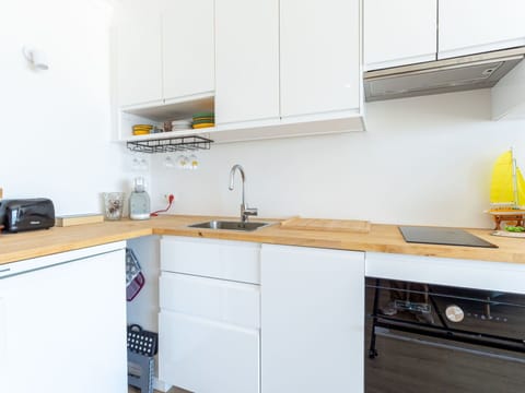 Kitchen, Countertop, Kitchen Appliance, Flooring, Cabinetry, Interior Design, Major Appliance, Wood, Furniture, Floor