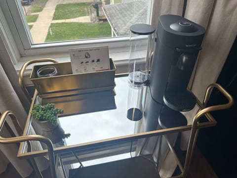 Nespress Vertuo with a few pods, creamers and sugars to start your stay