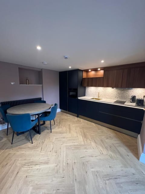 Enjoy ample space in Wordsworth's kitchen diner with a table for four – a perfect spot for a meal or, if you must, a bit of work. Versatile and comfortable for whatever you choose to do.