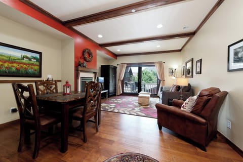 Main Living and Dining Spaces - TV, Gas Fireplace, Deck and views of Smelter Mountain