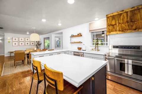Fully equipped kitchen with island seating.