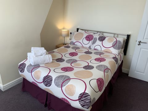 Family Suite, 2 Bedrooms | Desk, iron/ironing board, free WiFi, bed sheets