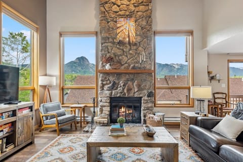 Main Living Space - Wood Burning Fireplace (wood provided), TV, Deck and Views
End Unit