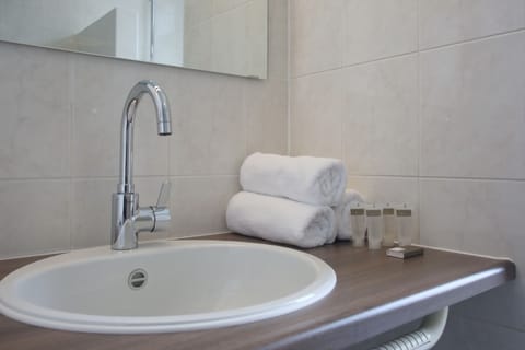 Standard Room | Bathroom | Free toiletries, hair dryer, towels, soap