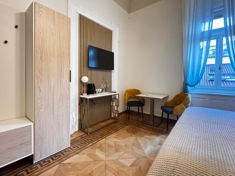 Deluxe Room, City View | Pillowtop beds, in-room safe, individually furnished, desk