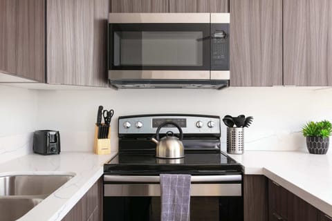 "Prepare meals with ease in our fully-equipped kitchen."