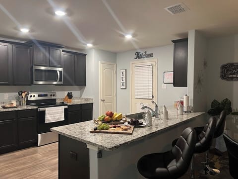 Fully equipped kitchen with modern appliances for all your cooking needs.