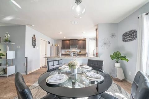 Enjoy meals together at the dining table with seating for 4.