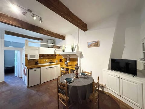 open space, television, kitchen, table