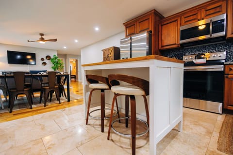 You’ll love cooking in this fully equipped kitchen steps from the dining area.