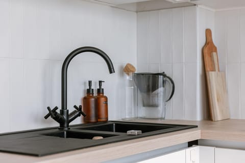 Black sink and faucet close-up