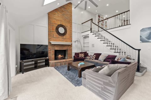 Curl up in the elegant living room & stream your favorites on the smart TV