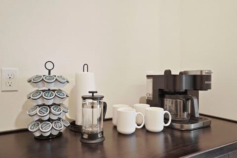 Stocked coffee bar just off kitchen