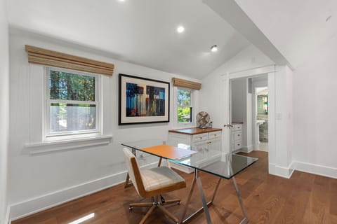 Work, if you must, there's plenty of room and a desk all ready for you.