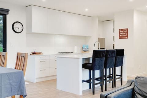 There is breakfast bar seating for those casual meals or for children to do homework.