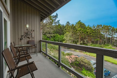 Enjoy stunning forest views from the balcony, surrounded by lush greenery, creating a serene escape in nature.