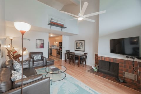 The Whale Watcher Suite features a spacious gathering space for relaxing evenings by the coast.