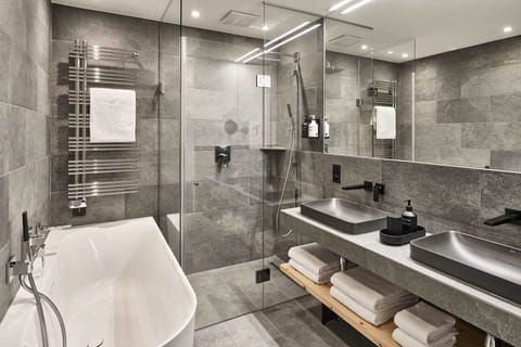 Separate tub and shower, hair dryer, towels, soap