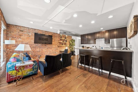 Curl up in the chic living room & stream your favorites on the smart TV​