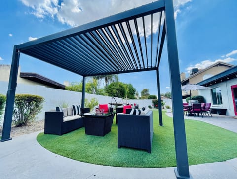 Unwind in the comfort of our serene backyard gazebo.