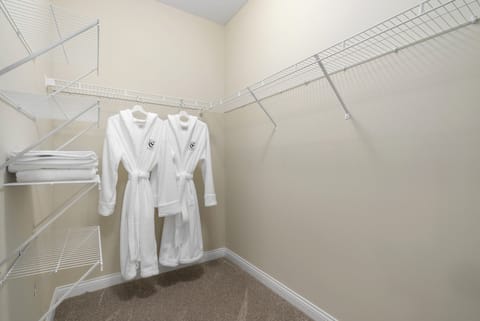 Master bedroom walk-in closet with our signature Frette hooded robes (guest favorite)