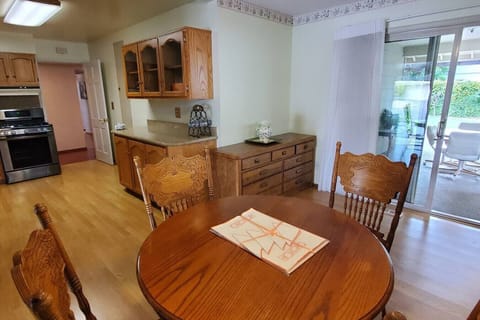 Cozy dining area with a wooden table and chairs