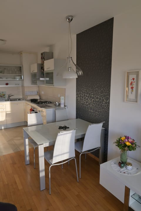 Apartment | Living area | 30-inch flat-screen TV with cable channels