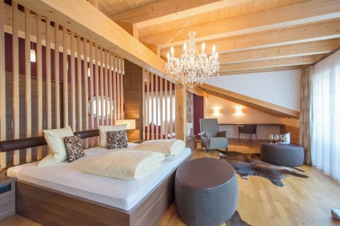 Deluxe Suite, Balcony, Mountain View | In-room safe, desk, free WiFi, bed sheets