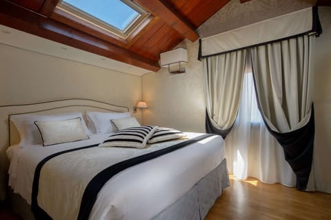 Down comforters, minibar, in-room safe, desk