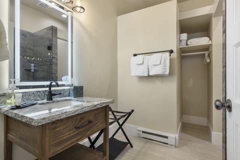 Comfort Room, 1 King Bed, Partial Ocean View | Bathroom | Shower, hair dryer, towels, soap