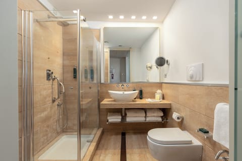 Shower, free toiletries, hair dryer, slippers