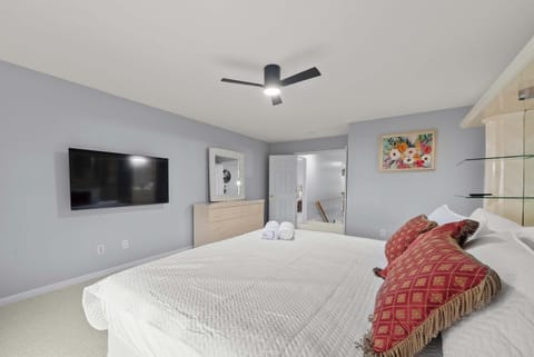 The primary king suite boasts a smart TV & ensuite bath