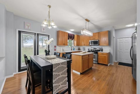 Sip morning coffee or grab a bite at the kitchen table, with space for 4