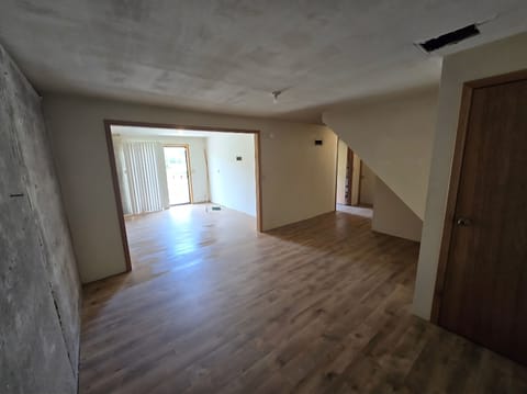 Full basement, laundry room, door to backyard.  Will furnish later to sleep 6.