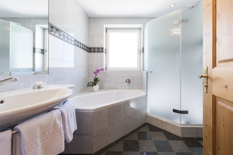 Junior Suite, 1 Double Bed | Bathroom | Hair dryer, towels