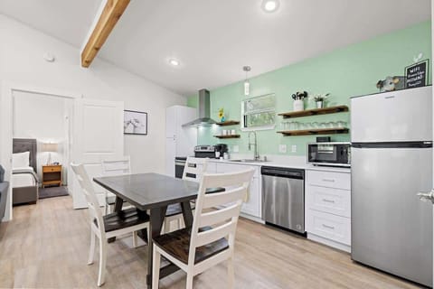 Full kitchen and seating for four.