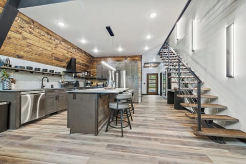 Fully stocked kitchen with island that seats 4