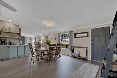 Seating for six at the dining table, plus there is an additional dining table seating four in the breakfast nook.