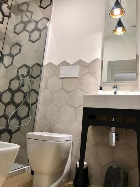 Shower, free toiletries, hair dryer, slippers