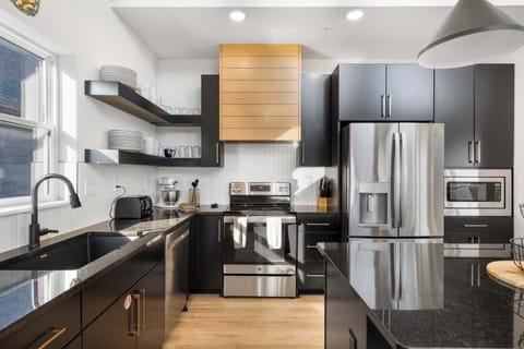 The sophisticated kitchen is well equipped for an unforgettable getaway