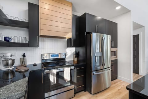 The sophisticated kitchen is well equipped for an unforgettable getaway