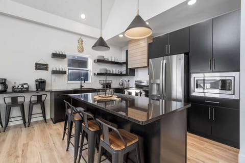 The sophisticated kitchen is well equipped for an unforgettable getaway