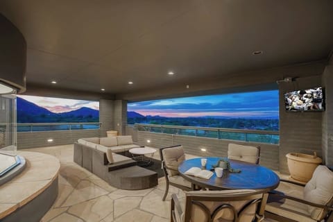 Relax on the patio with sweeping mountain and city views.