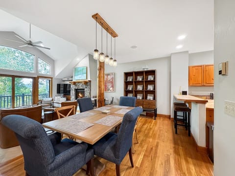 Gather everyone around the dining table for 6, with island seating for 2 more - no one gets left out of family meals. The open flow between kitchen and living areas keeps conversation flowing during cozy stay-in dinners