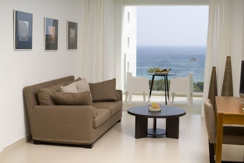 Junior Room, Sea View | Living area | 32-inch flat-screen TV with satellite channels, TV