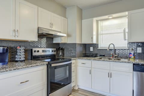 Modern kitchen with essentials for easy meals.