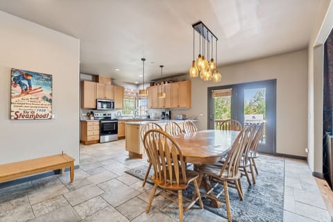 Dining area: Main floor, table seating for 8, outdoor access