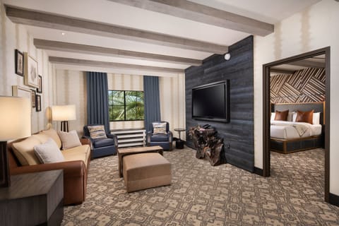 Luxe Lodge Suite | Living area | 55-inch Smart TV with cable channels, Netflix, pay movies